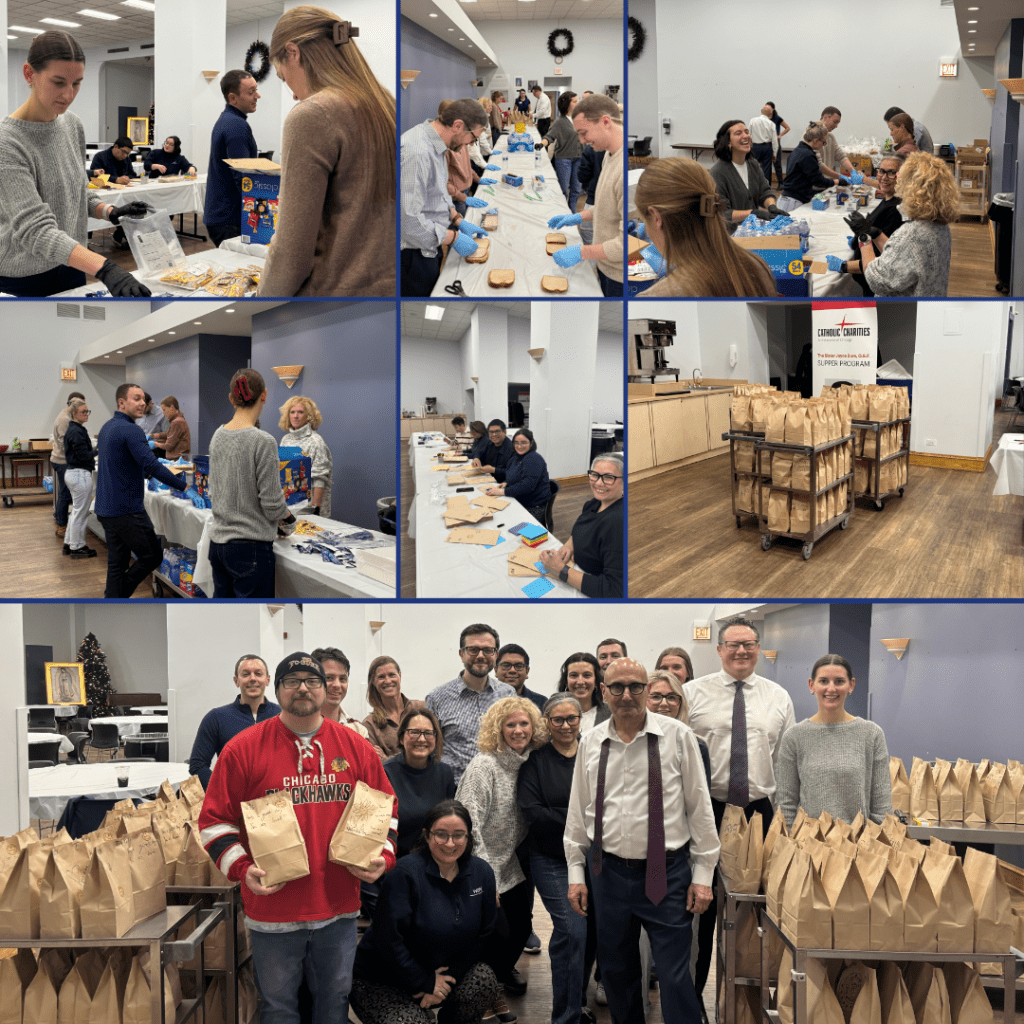 WBE staff and associates prepare bagged lunches for the Catholic Charities of the Archdiocese of Chicago